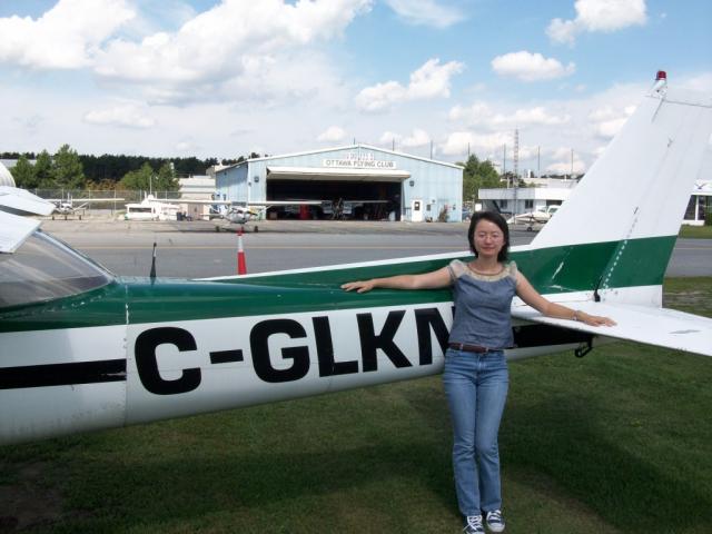 Quichen stands proudly in front of Cessna 150 GLKN: An important landmark in a pilot's life... first solo...